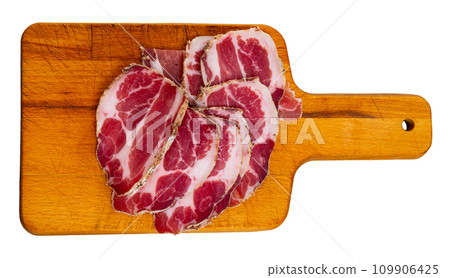 Delicious cut pieces dry cured pork neck. Traditional Spanish meat products Delicious cut pieces dry cured pork neck. Traditional Spanish meat products 109906425