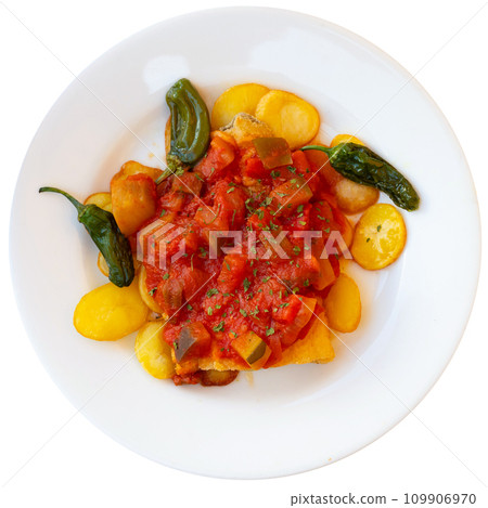 Stewed cod served with samfaina vegetables in restaurant Stewed cod served with samfaina vegetables in restaurant 109906970