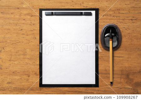 Blank paper, inkstone, and brush. calligraphy image 109908267
