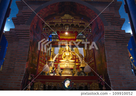 Sitting golden Buddha at Sacred Hall in Wat Tha Mai temple. Located at Samut Sakhon Province in Thailand. Sitting golden Buddha at Sacred Hall in Wat Tha Mai temple. Located at Samut Sakhon Province in Thailand. 109910052
