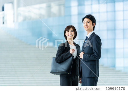 Male and female employees business image Male and female employees business image 109910178