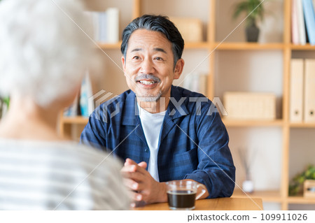 A senior couple chatting. A senior couple chatting. 109911026