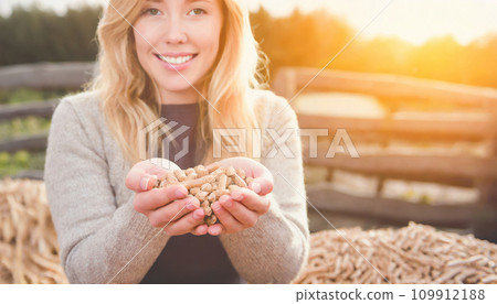 Harmony in Hands: Woman's Grasp on Sustainable Biomass Harmony in Hands: Woman's Grasp on Sustainable Biomass 109912188