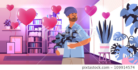guy in love holding potted plants happy valentines day celebration concept living room interior with pink air balloons in heart shape 109914574