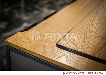 Empty rough wooden table top in the dark room Empty rough wooden table top in the dark room 109914767