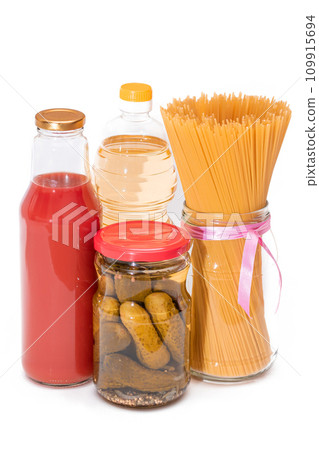 Food Reserves: Canned Food, Spaghetti, Pickles and Tomato Juice - Isolated on White Background Food Reserves: Canned Food, Spaghetti, Pickles and Tomato Juice - Isolated on White Background 109915694