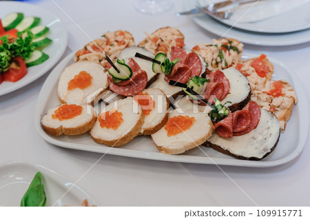 Canape with red caviar. Wedding buffet 109915771