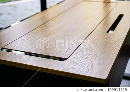 Empty rough wooden table top in the dark room 109915819
