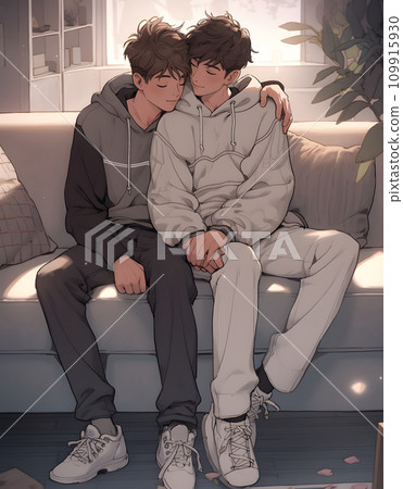 Male couple sitting on the sofa and hugging each other Male couple sitting on the sofa and hugging each other 109915930