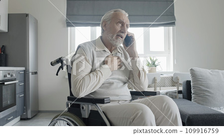 Elderly man calling emergency services, suffering from chest pain, heart failure, first aid 109916759
