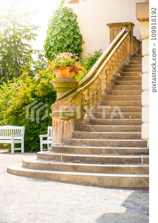 Historical outdoor stone staircase in the chateau on sunny summer day Historical outdoor stone staircase in the chateau on sunny summer day 109918192