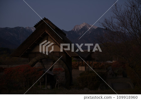 Watermill in Suisha-no-Sato Park and Mt. Kaikomagatake waiting for the morning sun Watermill in Suisha-no-Sato Park and Mt. Kaikomagatake waiting for the morning sun 109918960