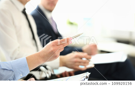 Gorgeous woman with pen 109920156