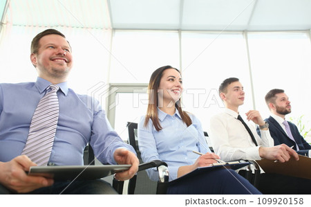 Happy colleagues in office Happy colleagues in office 109920158