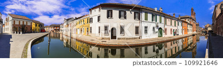 Comacchio - charming medieval town with street canals . famous as Little Venice in Emilia Romagna region of Italy. Comacchio - charming medieval town with street canals . famous as Little Venice in Emilia Romagna region of Italy. 109921646