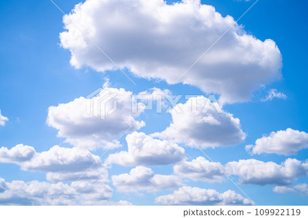 Beautiful blue sky and white cumulus clouds abstract background. Cloudscape background. Blue sky and fluffy white clouds on sunny days. Blue sky and daylight. World Ozone Day. Ozone layer. Summer sky. 109922119