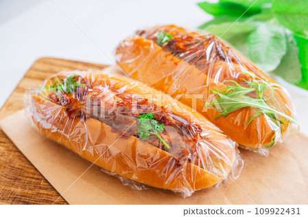 hot chili dog wrapped in plastic wrap 109922431