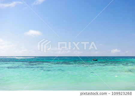 Anse Royale, Seychelles. Coastal view with small fishing boat 109923268