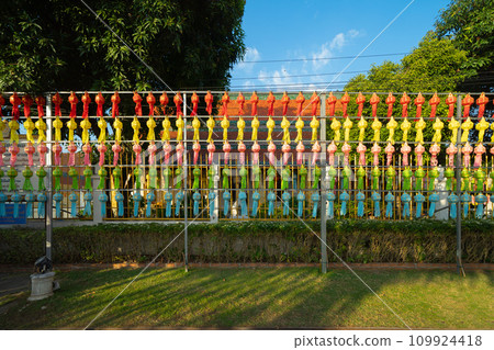 Colorful lanterns or lamps in travel trip and holidays vacation concept. Traditional festival in Harikulchai Temple, Lamphun, Thailand. Traditional ceremony in Asia. Celebration 109924418