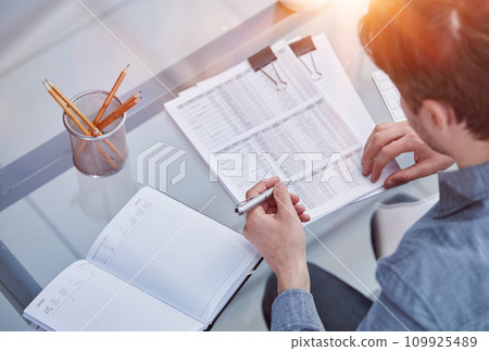 legal expert professional lawyer reading and checking financial documents or insurance contract legal expert professional lawyer reading and checking financial documents or insurance contract 109925489