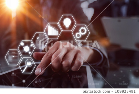 businessman pressing his finger on the screen of the digital tab 109925491