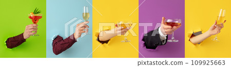 Banner. Creative collage. Hands with cocktail glass breaks through multicolored paper background. Modern fashion photo. Ad. 109925663