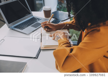 Finance manager meeting discussing company growth project success financial statistics, professional investor working start up project for strategy plan with document, laptop and digital tablet. 109927081