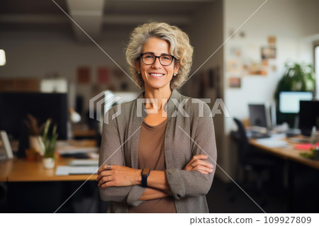 Empathetic Expertise: A Smiling Psychologist Over 50 in Her Well-Appointed Office Empathetic Expertise: A Smiling Psychologist Over 50 in Her Well-Appointed Office 109927809
