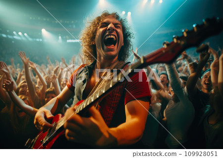 Electric Crowd: Rocker Amidst Concert Frenzy 109928051