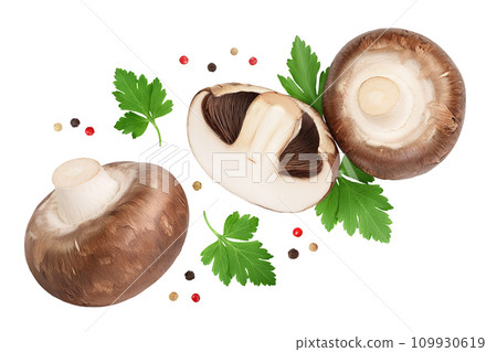 Royal Brown champignon with leaf parsley isolated on white background . Top view. Flat lay 109930619