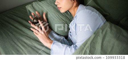 beautiful woman in pajamas beautiful woman in pajamas 109933318