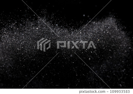 Explosion metallic black glitter sparkle. Dark Glitter powder spark blink celebrate, blur foil explode in air, fly throw black glitters particle. Black background isolated, selective focus Blur bokeh Explosion metallic black glitter sparkle. Dark Glitter powder spark blink celebrate, blur foil explode in air, fly throw black glitters particle. Black background isolated, selective focus Blur bokeh 109933583