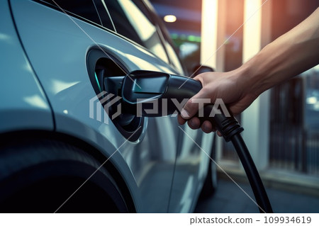 AI-generated content. Electric car or EV is charging, Hand inserting EV charging plug to electric vehicle, AI Generative 109934619