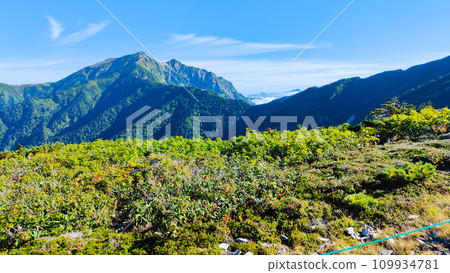 Climbing Mt. Jigatake in summer (Taneike Sanso - View of Mt. Kashima Yarigatake from the ridgeline of Mt. Jigatake) Climbing Mt. Jigatake in summer (Taneike Sanso - View of Mt. Kashima Yarigatake from the ridgeline of Mt. Jigatake) 109934781