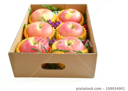 beautiful pink apple in the box on white background 109934901