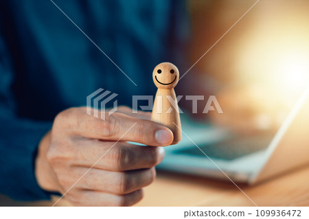 HR manager or Human resources. Employer hand choose takes person woman wooden doll with smile face. Leader stands out from crowd. Looking for good worker. HR, HRM, HRD concepts. 109936472
