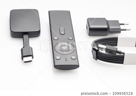 wireless internet TV set, set-top box and modern remote control, white background, selective focus, telecommunications equipment and technology concept 109936528
