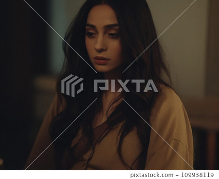 Portrait of a young brunette woman. 109938119