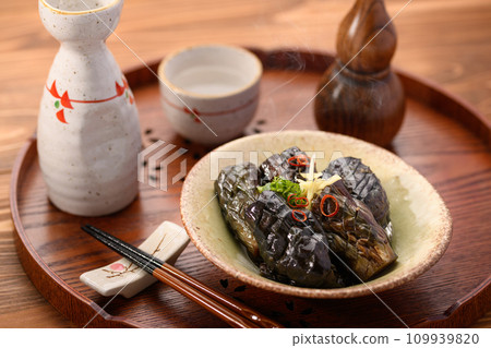 Home-cooked boiled eggplant and hot Japanese sake Home-cooked boiled eggplant and hot Japanese sake 109939820