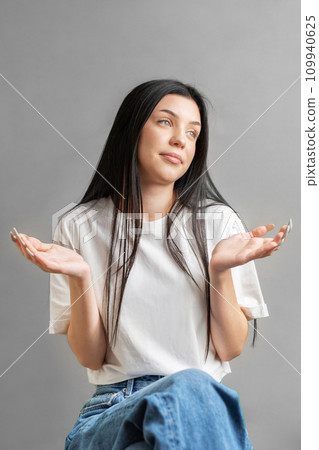 Portrait of a young girl who looks sad. Portrait of a young girl who looks sad. 109940625