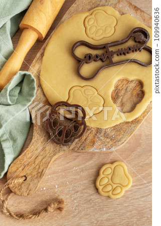 Preparing homemade healthy dog treats. Preparing homemade healthy dog treats. 109940636