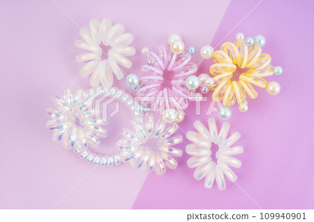 Colorful plastic hair elastics set. Colorful plastic hair elastics set. 109940901