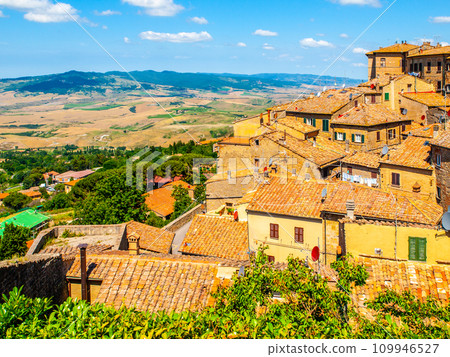 Panoramic view of Volterra - medieval Tuscan town with old houses, towers and churches, Tuscany, Italy. Panoramic view of Volterra - medieval Tuscan town with old houses, towers and churches, Tuscany, Italy. 109946527