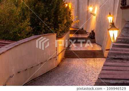 Old castle staircase at Prague Castle by night. Prague, Czechia Old castle staircase at Prague Castle by night. Prague, Czechia 109946529