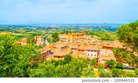 Panoramic view of Tuscan town and landscape from tower of San Gimignano, Tuscany, Italy 109946535