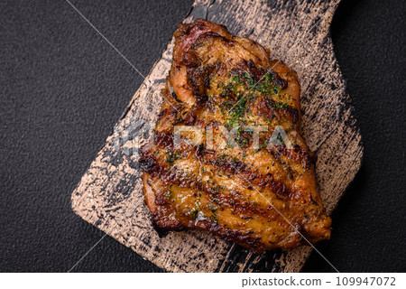 Delicious juicy beef or chicken steak with salt, spices and herbs Delicious juicy beef or chicken steak with salt, spices and herbs 109947072