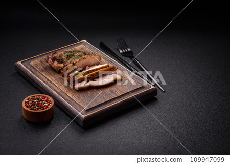 Delicious juicy beef or chicken steak with salt, spices and herbs Delicious juicy beef or chicken steak with salt, spices and herbs 109947099
