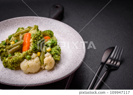 Delicious fresh vegetables steamed carrots, broccoli, cauliflower Delicious fresh vegetables steamed carrots, broccoli, cauliflower 109947117