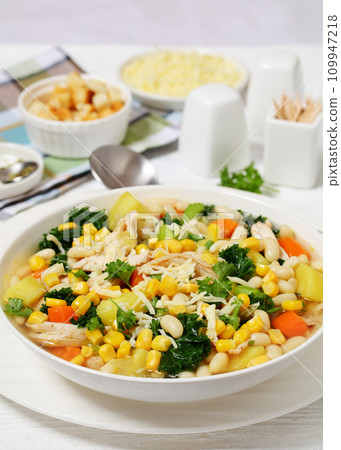 Chicken and white bean soup with veggies, corn Chicken and white bean soup with veggies, corn 109947218