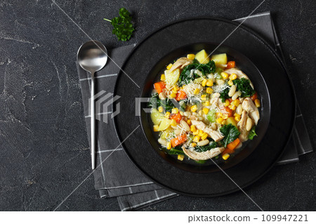 Chicken and white bean soup with veggies, corn 109947221